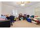 Spacious and uncluttered bedroom filled with an assortment of items at 105 N Florida Ave, Howey In The Hills, FL 34737