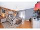 Cozy bedroom with decorative wood wall, buffalo check bedding, and a neutral area rug at 1301 Fahnstock St, Eustis, FL 32726