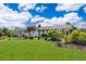 Ranch-style home with a well-manicured lawn and updated landscaping, showcasing its curb appeal at 1301 Fahnstock St, Eustis, FL 32726