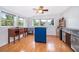 This eat-in kitchen is illuminated by natural light with views from the surrounding windows at 1301 Fahnstock St, Eustis, FL 32726