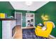 The living room features an electric fireplace and a desk nook with a colorful aesthetic at 1301 Fahnstock St, Eustis, FL 32726