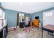 Well-lit office space with modern desk, comfortable chair, and neutral colored walls at 1301 Fahnstock St, Eustis, FL 32726