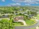 Aerial view of the property within its neighborhood, showcasing the circular driveway and private pool area at 137 N Spring Lake Dr, Altamonte Springs, FL 32714