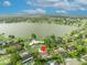 Aerial view of the home and neighborhood, ideally situated near a lake and other amenities at 137 N Spring Lake Dr, Altamonte Springs, FL 32714