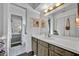 Bathroom with a single sink vanity and white walls, with a connecting bedroom at 137 N Spring Lake Dr, Altamonte Springs, FL 32714