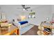 Bedroom with ceiling fan, wood floors, white walls and simple decor with writing on wall at 137 N Spring Lake Dr, Altamonte Springs, FL 32714