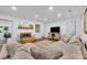 Comfortable living room with a stone fireplace and wooden accents, perfect for relaxation and entertainment at 137 N Spring Lake Dr, Altamonte Springs, FL 32714