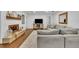 Living room features a stone fireplace, shiplap walls, and contemporary decor at 137 N Spring Lake Dr, Altamonte Springs, FL 32714