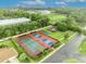 Aerial view of the community tennis and pickleball courts, and playground at 137 N Spring Lake Dr, Altamonte Springs, FL 32714