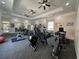 Community gym with many cardio machines and free weights at 1370 Tuscan Ter # 2202, Davenport, FL 33896
