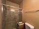 Tiled shower with glass door at 1370 Tuscan Ter # 2202, Davenport, FL 33896