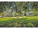 Charming home with a beautifully landscaped front yard and stone accents, providing great curb appeal at 14128 Bramble Bush Ct, Orlando, FL 32832