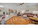 Inviting living room featuring hardwood floors and comfortable leather furnishings at 14128 Bramble Bush Ct, Orlando, FL 32832