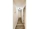Hallway showcasing updated flooring, neutral wall color, and recessed lighting at 14700 Chadbury Ct, Orlando, FL 32828