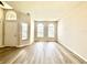 Bright living room with large windows, new flooring, and plenty of natural light at 14700 Chadbury Ct, Orlando, FL 32828