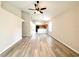 Expansive open-concept living room featuring wood floors and high ceilings at 14700 Chadbury Ct, Orlando, FL 32828