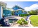 Beautiful backyard featuring a water feature, lush greenery, and ample space at 1609 E Kaley Ave, Orlando, FL 32806