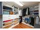 Organized walk-in closet with custom shelving and ample storage space for clothing, shoes, and accessories at 1609 E Kaley Ave, Orlando, FL 32806