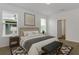 Serene bedroom with neutral tones, natural light, and stylish decor at 16242 Outlook Shore Aly, Winter Garden, FL 34787