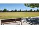 Expansive community field with lush green grass, offering space for various outdoor activities at 16242 Outlook Shore Aly, Winter Garden, FL 34787