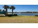 Scenic view of a community pond with a fountain, enhancing the serene atmosphere at 16242 Outlook Shore Aly, Winter Garden, FL 34787