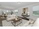 Tastefully decorated living room with modern furnishings and ample natural light at 16242 Outlook Shore Aly, Winter Garden, FL 34787