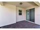 Covered patio featuring brick pavers and a sliding door at 16242 Outlook Shore Aly, Winter Garden, FL 34787