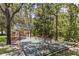 Community playground featuring swings, slides, and climbing structures for enjoyment at 165 Scrub Jay Way, Davenport, FL 33896
