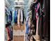 Walk-in closet providing ample storage space with shelving, hanging racks, and organizers at 1692 Blue Grass Blvd, Deland, FL 32724