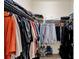 Walk-in closet providing ample storage space with shelving and hanging rods at 1692 Blue Grass Blvd, Deland, FL 32724