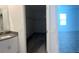 Well-lit area showcasing sink, vanity, and closet creating a serene and functional space at 1889 Blissful Dr, Kissimmee, FL 34744