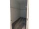 Walk-in closet with ample storage space and carpeting, providing a practical solution for organization at 1889 Blissful Dr, Kissimmee, FL 34744