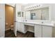 Spacious bathroom with dual sinks, vanity area, and separate toilet room at 1936 Westpointe Cir, Orlando, FL 32835