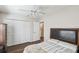 Bright bedroom with ceiling fan, closet, and hardwood flooring at 1936 Westpointe Cir, Orlando, FL 32835