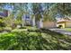 Charming two-story home with well-maintained landscaping and a spacious two-car garage at 1936 Westpointe Cir, Orlando, FL 32835