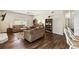 Comfortable living room with plush sofas, hardwood floors, and bright natural light at 1936 Westpointe Cir, Orlando, FL 32835