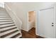 View of stairway leading to a laundry closet with a washing machine and dryer at 1936 Westpointe Cir, Orlando, FL 32835