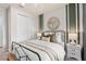 Stylishly decorated bedroom with a well-made bed and matching nightstands at 2348 Daisy Tree Rd, St Cloud, FL 34771