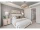 Inviting bedroom featuring soft lighting, a comfortable bed, and stylish decor at 2348 Daisy Tree Rd, St Cloud, FL 34771