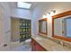 Bathroom featuring double vanity, granite counters, and a shower-tub combination at 247 W Sabal Palm Pl, Longwood, FL 32779