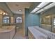 Bright bathroom with dual sinks, large mirror, and ample natural light at 247 W Sabal Palm Pl, Longwood, FL 32779