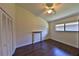 Cozy bedroom with hardwood floors, closet, and small decorative fireplace at 247 W Sabal Palm Pl, Longwood, FL 32779