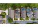 Aerial view shows the property's location within a neighborhood with well-kept lawns, trees and proximity to other homes at 2638 Clarinet Dr, Orlando, FL 32837