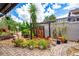 Tranquil backyard featuring tropical plants, stone waterfall feature and patio with pavers at 2638 Clarinet Dr, Orlando, FL 32837