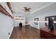 Versatile bonus room with hardwood floors, ceiling fan, and ample space for customization at 2638 Clarinet Dr, Orlando, FL 32837