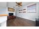 Inviting bonus room with hardwood floors, ceiling fan, and bright natural light at 2638 Clarinet Dr, Orlando, FL 32837