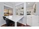 Eat-in kitchen features a breakfast bar with Quartz countertop and stainless steel appliances at 2638 Clarinet Dr, Orlando, FL 32837