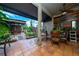 Relaxing covered patio with tiled floor, ceiling fan, and a beautiful view of the lush garden at 2638 Clarinet Dr, Orlando, FL 32837