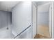 Upstairs hallway leading to carpeted bedroom at 2719 Candlewood Ct, Apopka, FL 32703