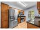 Well-lit kitchen featuring stainless steel appliances and granite countertops at 2719 Candlewood Ct, Apopka, FL 32703
